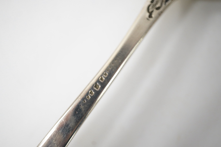 A pair of George III Irish engraved silver berry spoons, by J. Brady, Dublin, 1799, 23.8cm, 143 grams. Condition - fair